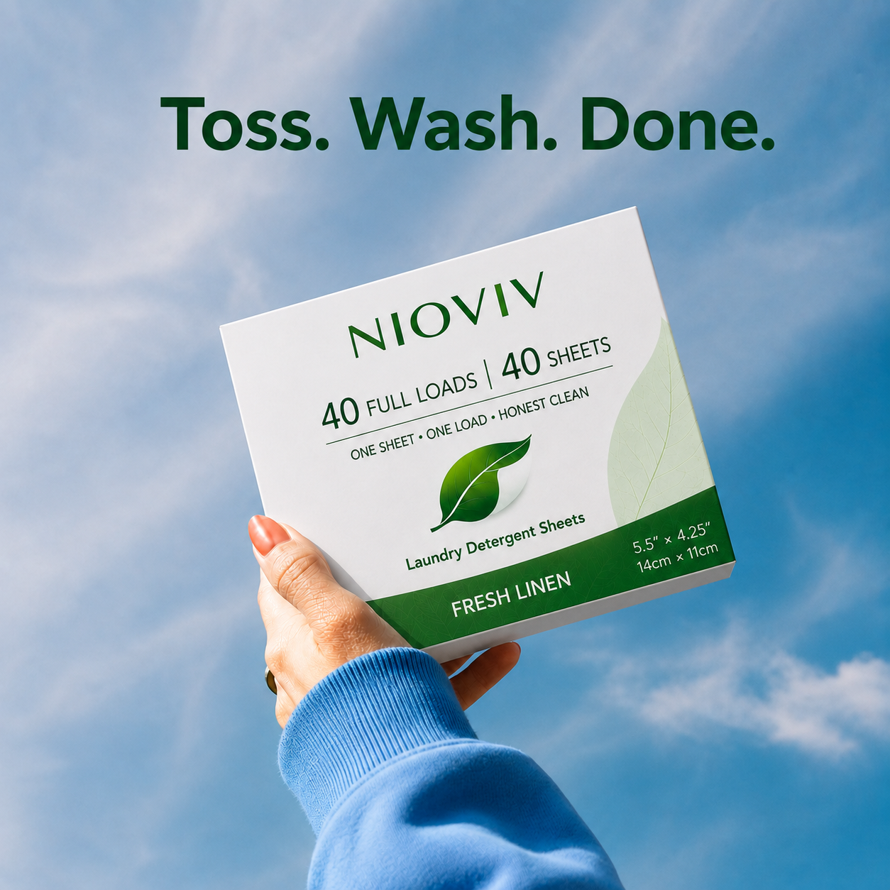 Hand holding the Nioviv box against a blue sky — Toss. Wash. Done.